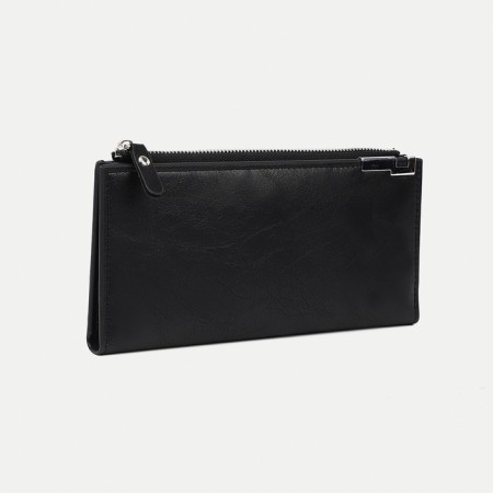 Male purse on a magnet, external pocket, black color