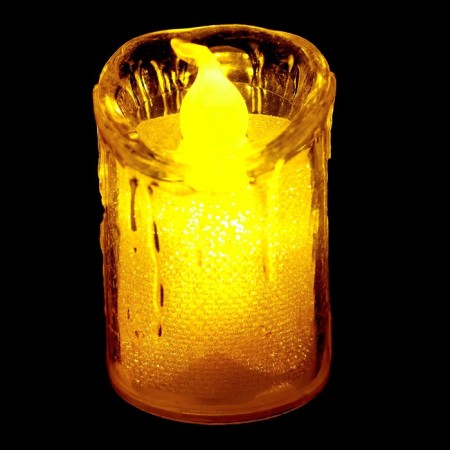 The candle is LED, burning yellow-2
