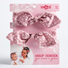 A set of dressings on the head for mom and daughter 
