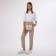 Female bag on a valve, beige color