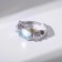 Ring under the natural stone "Sunset", purple color in silver, dimensionless