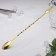 Spoon of barn stainless steel with a fork, length 32.5 cm, gold color