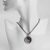 A pendant on the yin-yang lace amulet, colored on a black lace, 40 cm