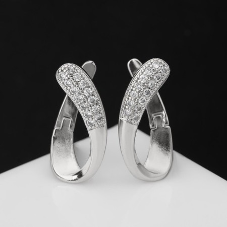 Earrings with rhinestones "Magic" curl, white color in silver-1