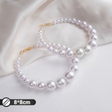 Ring earrings “Tenderness of pearls” are large, white color in gold, D = 8 cm