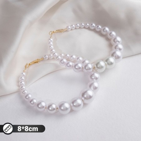 Ring earrings “Tenderness of pearls” are large, white color in gold, D = 8 cm