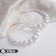 Ring earrings “Tenderness of pearls” are large, white color in gold, D = 8 cm