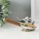Polystone souvenir "Sinichka sit on a shovel, with flowers" 17x5x7 cm