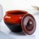 A hot “classic” pot with a dark lid, 0.9l