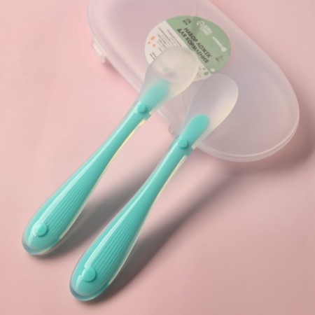 A set of silicone spoons for feeding, 2 pcs., In a container, the color is turquoise