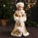 Snow Maiden "In a clutch with fur bombs" 43 cm, golden-white