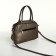 Women's bag with lightning, bronze color