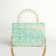 Baby bag on a valve, green color