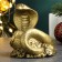 Figure "Snake on money with a barrel" Old gold, 6x6x5cm