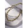 The necklace "wire" is prickly, the color is gold, l = 45 cm