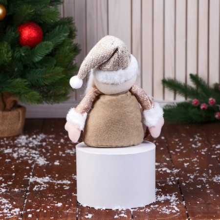 Soft toy "Santa Claus in a knitted cap" sits, 15x22 cm, golden brown-1