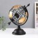 Souvenir Metal "Globe with an arrow" Black 27x17x30 cm