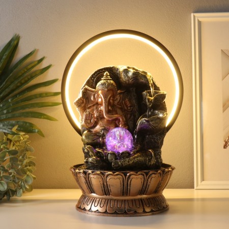 Table Polystone Fountain from the Network, Ganesha's backlight in gold near the waterfall - hand "25x20x34 cm