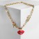 Piece "chain" lips and match, red color in gold, 45 cm