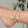 Bracelet on the leg "Pearl on the shell" Color gold, l = 10.5 cm