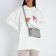 Bag Cross-Bodi with a zipper, gray color