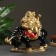 Figure "Hotty on the buffalo" red gold 46x22x38.5cm