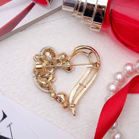 Brooch "Heart" in stones, colored in gold-2