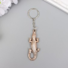 A plastic key under the Golden Crocodile metal 5.4x2x0.7 cm