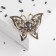 Brooch "Butterfly" leopard, golden gray color in black gold