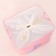 A basket for storing toe with a puff on a rope, 40 x 50 x 48 cm, pink