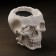 Figure candle in concrete "Crying Skull", black
