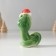 Souvenir Ceramics "Green Cobra in the New Year's cap" 4x6x8 cm