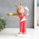 Souvenir Polystone stand "Baby with paper aircraft" pink 35x21x13 cm