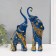 Souvenir Polystone "Blue elephants with orange rhinestones" set 28.5x21x8.3 cm