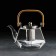 Glass teapot with a bamboo cover and metal sieve "Octo", 1.2 liters