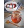 Bank with a spoon for honey Kilner