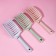 The comb is massage, wide, ventilated, 7.3 × 25.3 cm, mix color