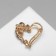 Brooch "Heart" in stones, colored in gold