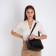 Female bag on one shoulder, on a zipper, black color