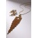 Set 2 objects: earrings, pendant "waterfall" square, white color in gold
