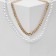 The necklace "chain" with beads, white color in gold, l = 45cm