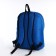 A backpack with a zipper, external pocket, blue color