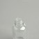 A bottle for storage, with a pipette, 30 ml, silver/white color