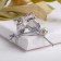 Brooch "Owls" on a flower branch, white-green color in silver
