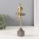 Souvenir Polystone "Man sits on the edge of the stone" Gold 4.2x10x27.5 cm