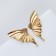 Earrings with rhinestones "bows" wings, white color in gold
