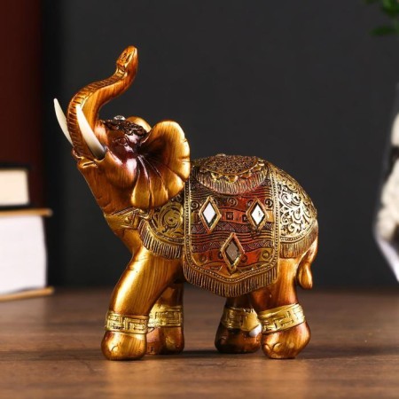 Polystone souvenir "African elephant in the gold, openwork blanket" MIX 12x11x4.7 cm
