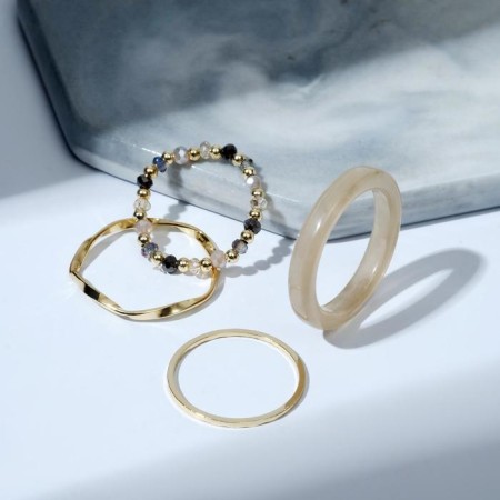 Ring set 4 pcs. "Crystals" Arabica, beige-gray color in gold, size mix-1