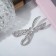 Brooch "Scissors" precious, white color in silver
