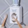 Mechanical “butterfly” toothpaste dispenser, 9.5 x 5.8 cm.